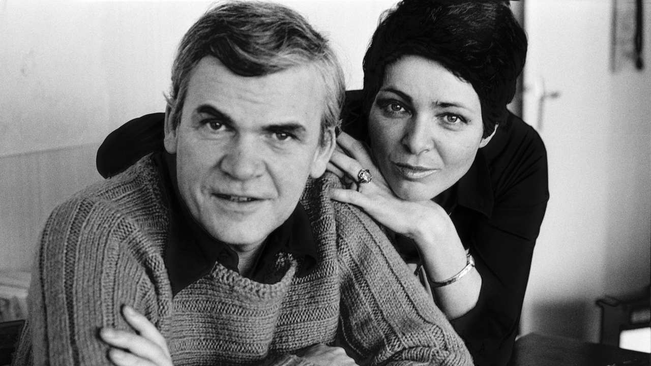 a man and a woman posing for a photo together